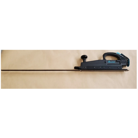 Air Powered foam saw with attached blade on brown and white background