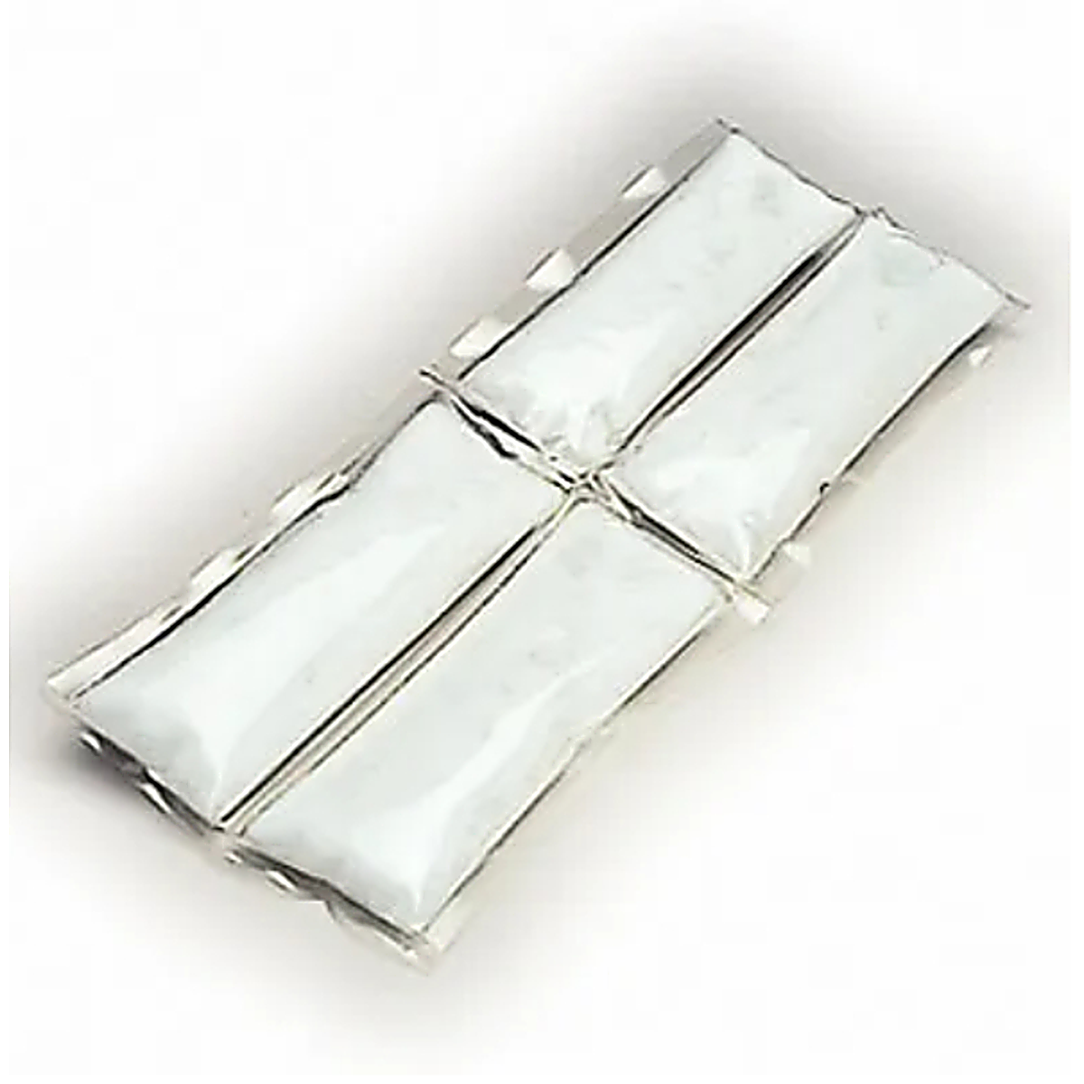 Four white pillows arranged in a diamond pattern on a light gray background
