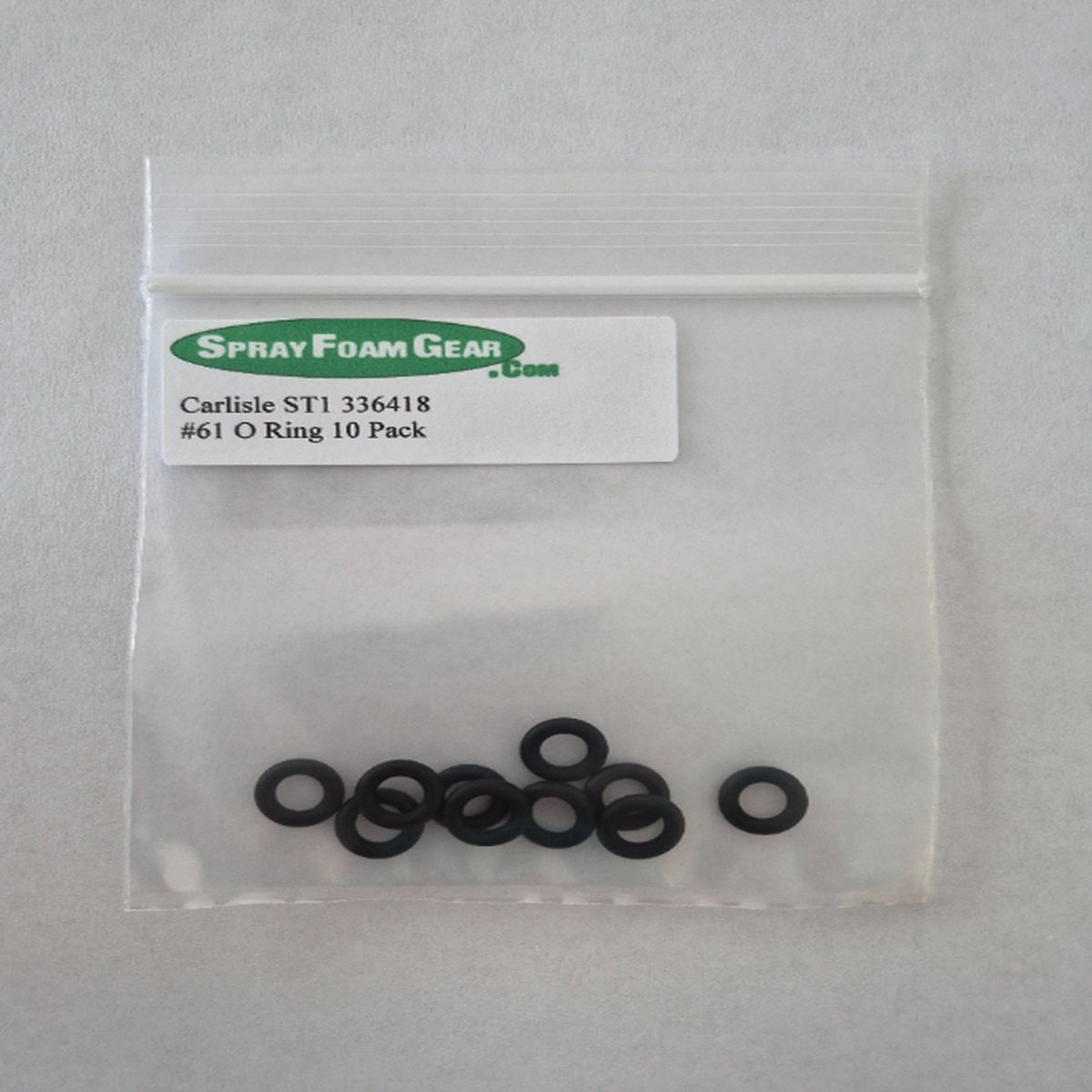 Bag of black O-rings with a label on a gray background