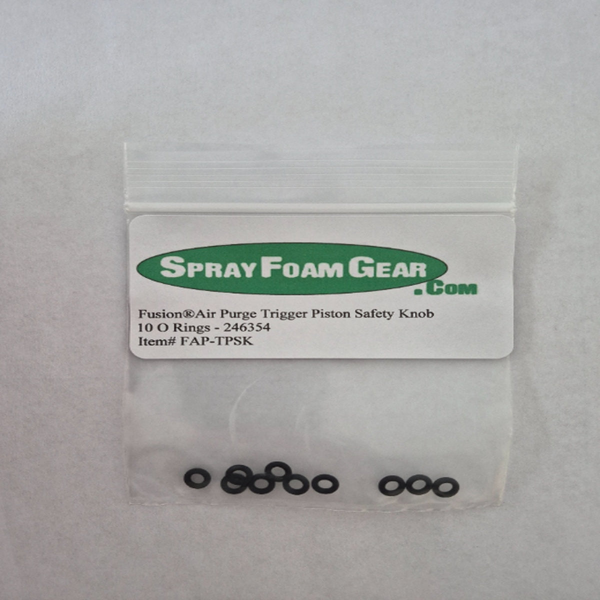 Spray Foam Gear packaging with O-rings on a gray background