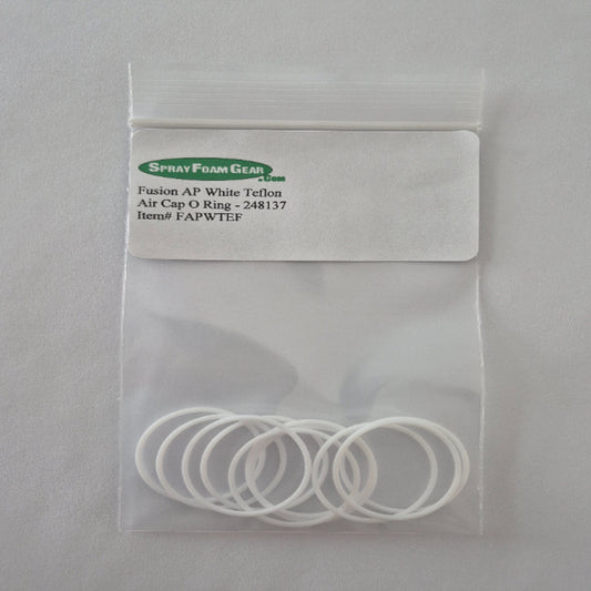 Clear plastic bag with white o-rings and a label on a gray background