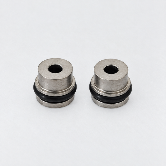 Pair of aftermarket Probler P2 stainless steel side seals with black O-rings for spray foam gun replacement and maintenance.