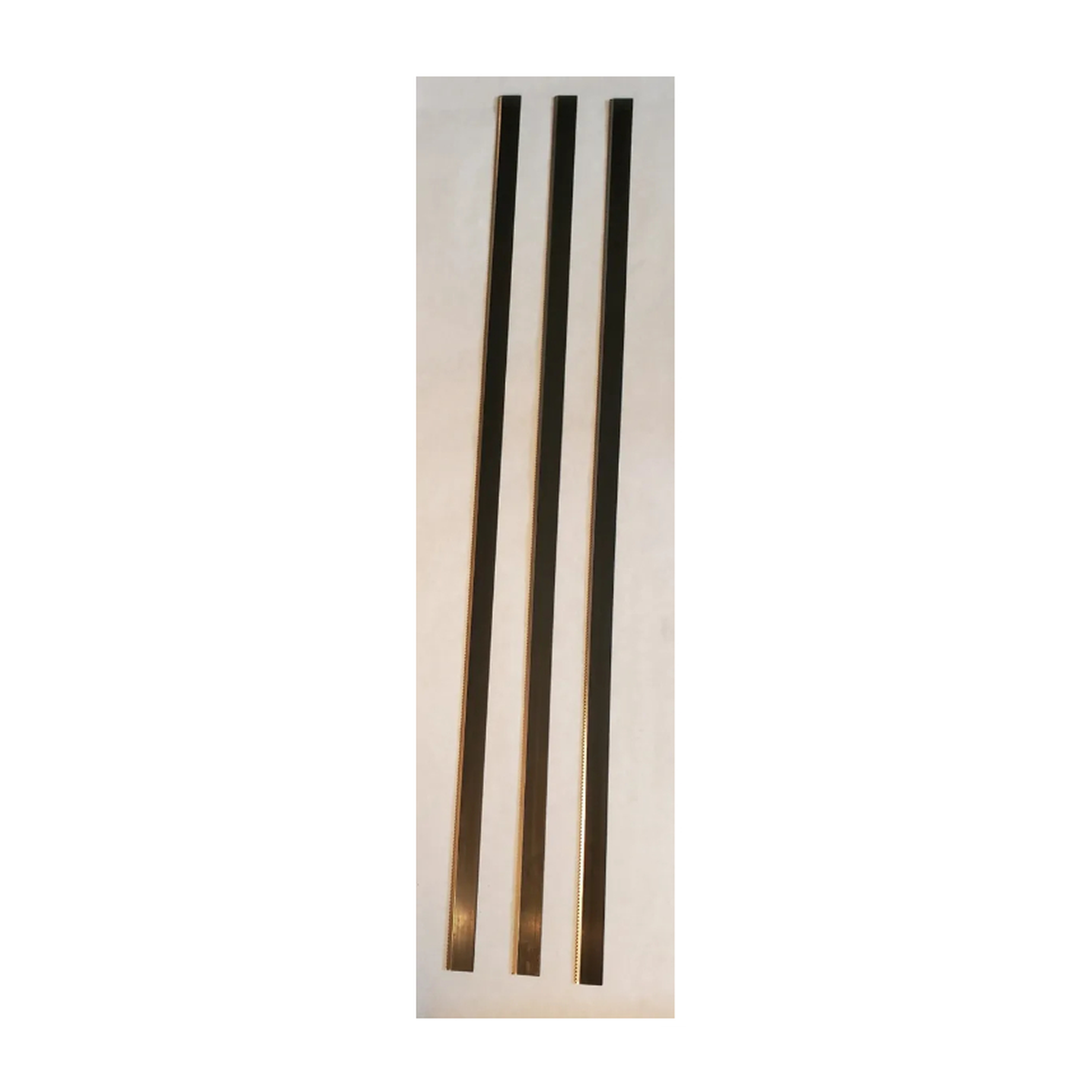 three 36 inch foam saw blades on a brown background